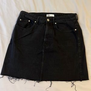 Black denim mini skirt